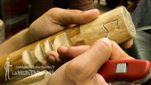 Carving a walking stick